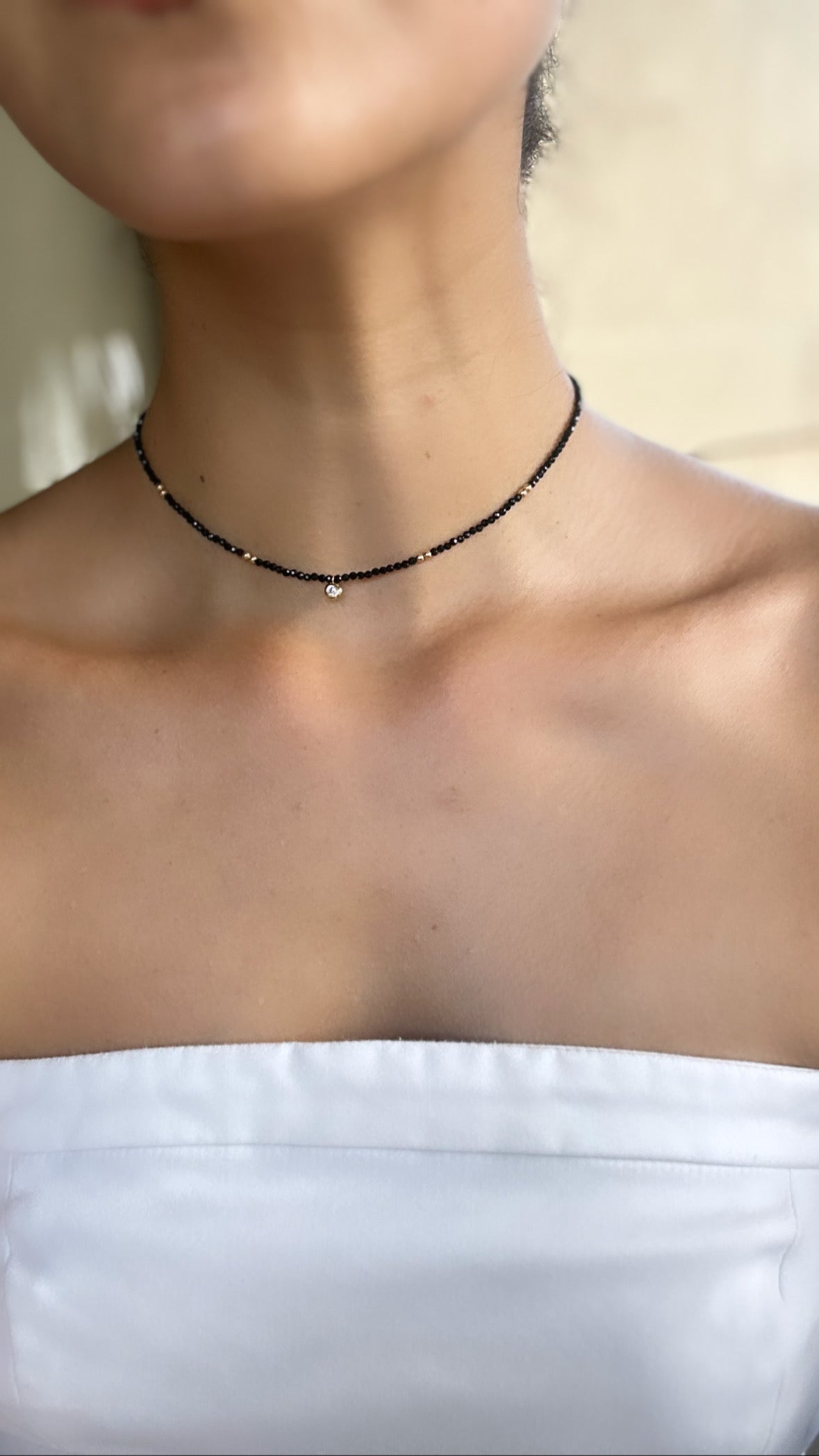 Onyx and gold beaded necklace